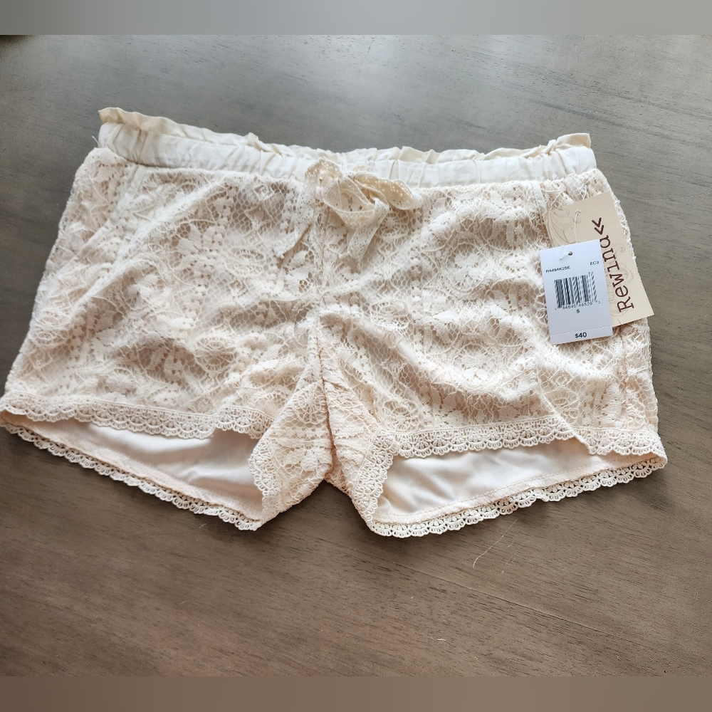 Rewind.  Cream color, lace overlay shorts, size S